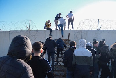 Protesters attempt to cross into the Kurdish-controlled city of Qamishli in north-eastern Syria, during a demonstration in support of Syrian Kurds, in Nusaybin, south-eastern Turkey. Reuters