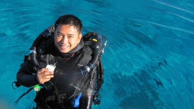 Jeffrey Catanjal disliked going out in the sun when he first came to the Middle East, now he is a diving instructor. Courtesy Jeffrey Catanjal