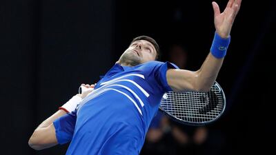 Novak Djokovic serves. EPA