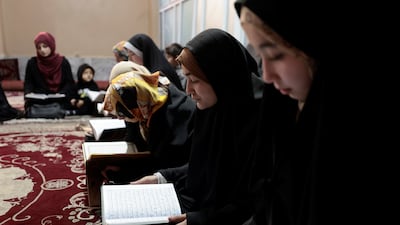 Afghan women and girls studying at a Kabul madrassa. There has been a surge in enrolments to religious schools. Reuters