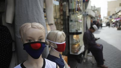 Mannequins sporting protective face masks in a street of Manama. EPA