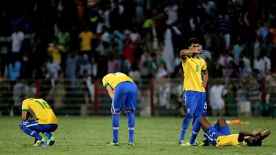 Brazil players were left shocked as the tournament favourites slipped out of the Under 17 World Cup in the quarter-final stage. Satish Kumar / The National
