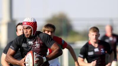 Dubai Exiles (in black) and Muscat tussle for ball during the West Asia Championship, first round match yesterday at The Sevens Stadium in Dubai. Ravindranath K / The National (to go with Paul story for sports) ID: 76110