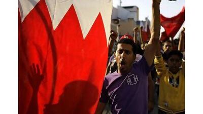 Protesters shout slogans during a rally in the Bahraini village of Malkiya yesterday. Sergey Ponomarev / AP Photo