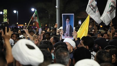 Protesters gather outside the Kuwaiti consulate in Basra on Wednesday after a house in the area was struck by rockets. Reuters