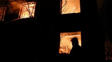 A firefighter works at the site of a Russian drone strike in Chuhuiv, Kharkiv region, Ukraine. Reuters