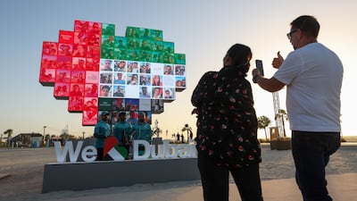 The We love Dubai installation on Kite Beach, where people can add their portrait. Chris Whiteoak / The National