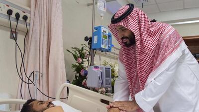 Saudi Crown Prince Mohammed bin Salman visiting security forces on June 25, 2017 who were injured when a suicide bomber targeting Islam’s holiest site of Mecca blew himself up two days earlier. Handout from Saudi Royal Palace via AFP