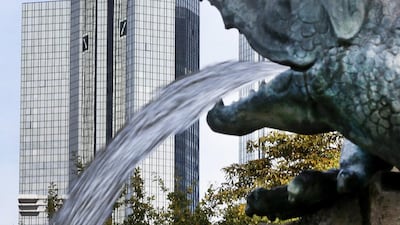 Deutsche Bank’s headquarters in Frankfurt, Germany. Deutsche Bank defied expectations on Thursday by posting a small profit versus an anticipated net loss for the third quarter. Michael Probst / AP Photo