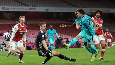 Liverpool's Diogo Jota, right, scores his side's third goal against Arsenal in their 3-0 win at the Emirates. AP.