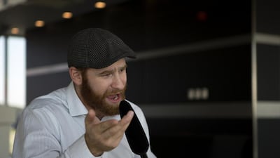 WWE wrestler Sami Zayn speaks during an interview at Yas Marina Circuit in Abu Dhabi on Wednesday. Christopher Pike / The National