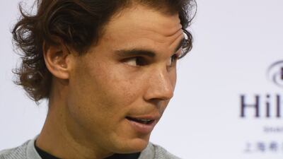 Rafael Nadal speaks in a press conference at the Shanghai Masters tennis tournament on Tuesday. Greg Baker / AFP / October 13, 2015