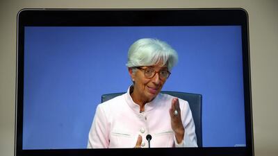 European Central Bank president Christine Lagarde appears on a laptop during a live stream of a news conference following its interest rate decision in Frankfurt, Germany. Hollie Adams