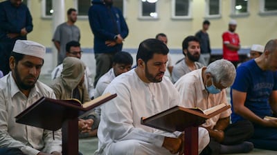 Morning Ramadan prayers at Bani Hashim Mosque, Abu Dhabi. Khushnum Bhandari / The National
