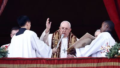 Pope Francis delivers his traditional Christmas Day Urbi et Orbi message to the city and the world from the main balcony of St. Peter's Basilica at the Vatican, December 25, 2022. REUTERS / Yara Nardi