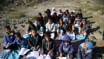 Afghan children take a class in open due to lack of school and facilities in Laghman. EPA