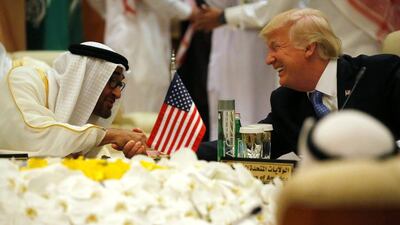 Donald Trump shakes hands with Sheikh Mohammed bin Zayed, Abu Dhabi Crown Prince and Deputy Supreme Commander of the UAE Armed Forces, as he sits down to a meeting with GCC leaders during their summit in Riyadh, Saudi Arabia on May 21, 2017. Jonathan Ernst / Reuters