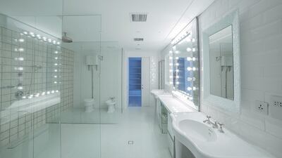 It has a bathroom for a movie star with lit-up vanity mirrors. Courtesy Allsopp & Allsopp
