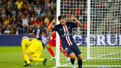 PSG's Pablo Sarabia reacts after missing a chance against Nimes. AP Photo
