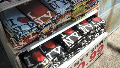 NEW YORK - MAY 10: Shirts bearing the "I Love New York" logo are displayed at a store in Times Square on May 10, 2010 in New York City. As a result of a $9.2 billion budget gap for the fiscal year that began April 1, New York State's "I Love New York" tourism office is proposing to cut tourism funding by 13 percent, from $12.2 million to $10.6 million. (Photo by Spencer Platt/Getty Images)