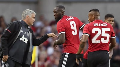 Jose Mourinho, left, is motivated ahead of his first game against Real Madrid since leaving the Spanish club in 2013. Niall Carson / Press Association