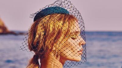 MYSTIC ELEGANCE: Dress, Dh8,400, Gucci; Veiled Beret, Dh1,640, Piers Atkinson at s*uce