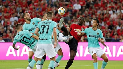 Paul Pogba is surrounded by Inter players. Reuters