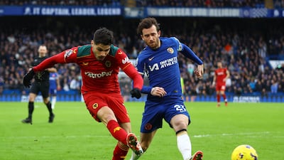 Wolves' Pedro Neto fights for the ball with Chelsea's Ben Chilwell. Reuters