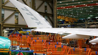 The signature folding wingtip of a 777X aircraft is seen.