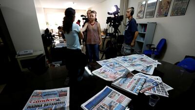 A journalist of pro-Kurdish Ozgur Gundem gives an interview to a German TV channel at their newsroom before a protest against the arrest of three prominent campaigners for press freedom. Reuters, file