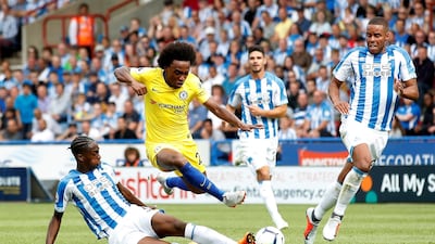 Chelsea's Willian in action with Huddersfield Town's Terence Kongolo. Action Images / Reuters