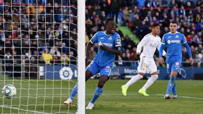 Djene Dakonam of Getafe reacts after Real Madrid's first goal. Getty Images