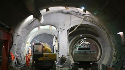 Concrete is spayed (left) on a crossover rail tunnel. Peter Macdiarmid / Getty Images