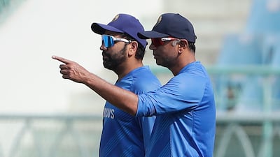 India captain Rohit Sharma, left, with coach Rahul Dravid. AP