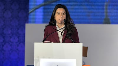 Lana Zaki Nusseibeh, ambassador and permanent representative of the United Arab Emirates to the UN, delivers a speech on the gender gap in Abu Dhabi on Monday. Christopher Pike / The National