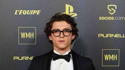 Tom Holland, in a black tuxedo, attends the Ballon D'Or photocall at Theatre du Chatelet on November 29, 2021 in Paris. Getty Images
