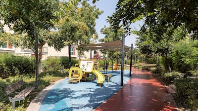 Lush greenery and parks surround the 440 villas inside the Dubai Science Park district. Antonie Robertson/The National.
