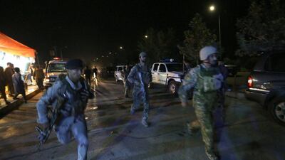 Afghan security forces rush to respond to an attack on the American University of Afghanistan in Kabul on August 24, 2016. Rahmat Gul/AP Photo