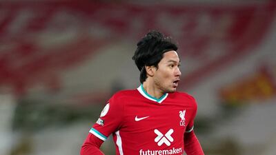 Takumi Minamino - 5: Replaced Mane for the closing minute. Managed to get into position to make an attempt at goal but scuffed the stoppage-time shot. Getty