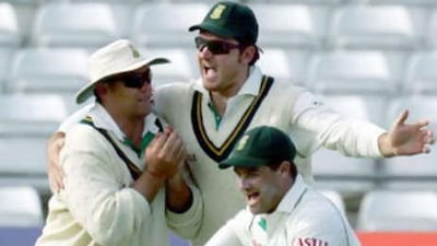 The South Africa players celebrate as another England wicket tumbles in the second Test match at Headingley.