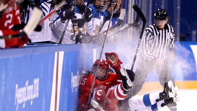 Valeria Pavlova representing Olympic Athletes from Russia and Finland's Minnamari Tuominen collide during the Women's Ice Hockey Bronze Medal game on day twelve of the 2018 Winter Olympic Games. Jamie Squire / Getty Images