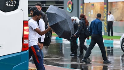 Catching a bus in the capital. Victor Besa / The National