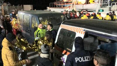 Some of the 49 migrants on board the NGO rescue ship Mare Jonio disembarked at Lampedusa's port on the orders of Guardia di Finanza tax police. EPA