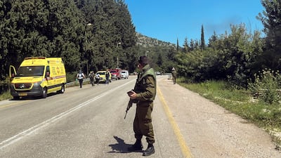 Soldiers and first responders near the scene of an attack in Israel's Arab Al Aramshe village on Wednesday. Reuters