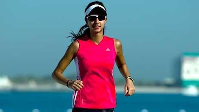 Yasmin Wadhai trains on the Abu Dhabi Corniche ahead of the Adventure Challenge, which involves, among other disciplines, cycling, running and kayaking.