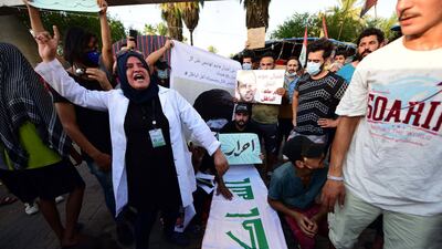 Protesters demonstrate after the killing of Iraqi academic Hisham Al Hashimi in Baghdad in July 2020. EPA
