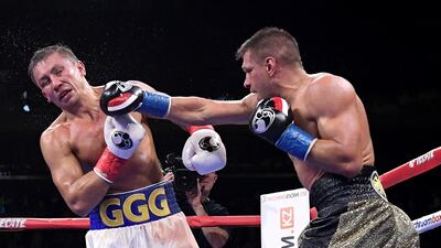 Sergiy Derevyanchenko punches Gennady Golovkin during their IBF middleweight title bout at Madison Square Garden. AFP