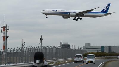 An ANA aircraft landing at Narita Airport in Japan. It and rival JAL have been hit by fuel costs. Bloomberg