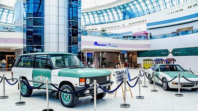 Abu Dhabi police's first generation Range Rover and a Porsche 924 on display in Abu Dhabi's Marina Mall. Seven Media