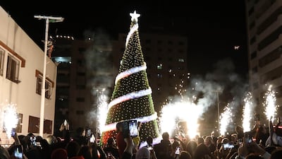 The grand tree lighting ceremony was accompanied by sparkler. AFP